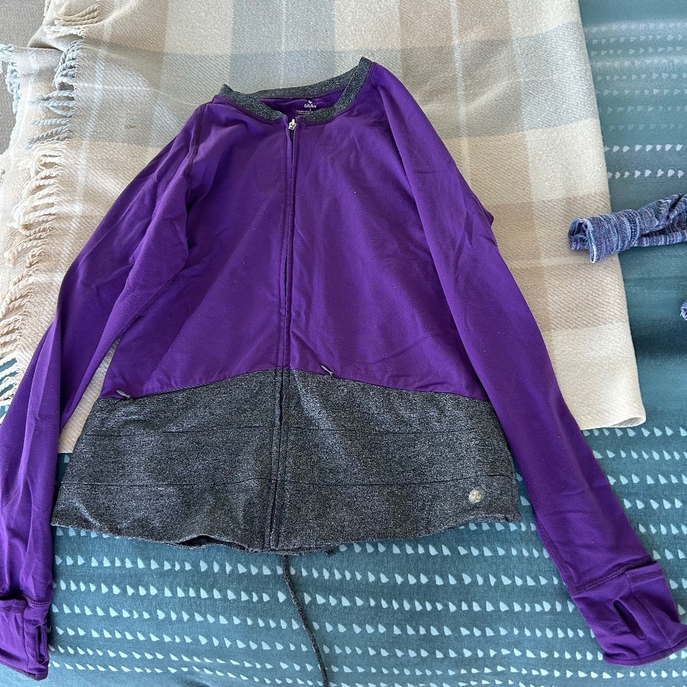 titika Jacket size 6 Criss Cross back hem